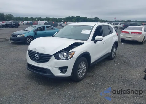 2016 Mazda Cx-5 Touring z USA, uszkodzony, nr VIN JM3KE4CY4G0902879